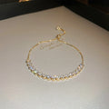 Bracelet Signature Ondulé en Cristal