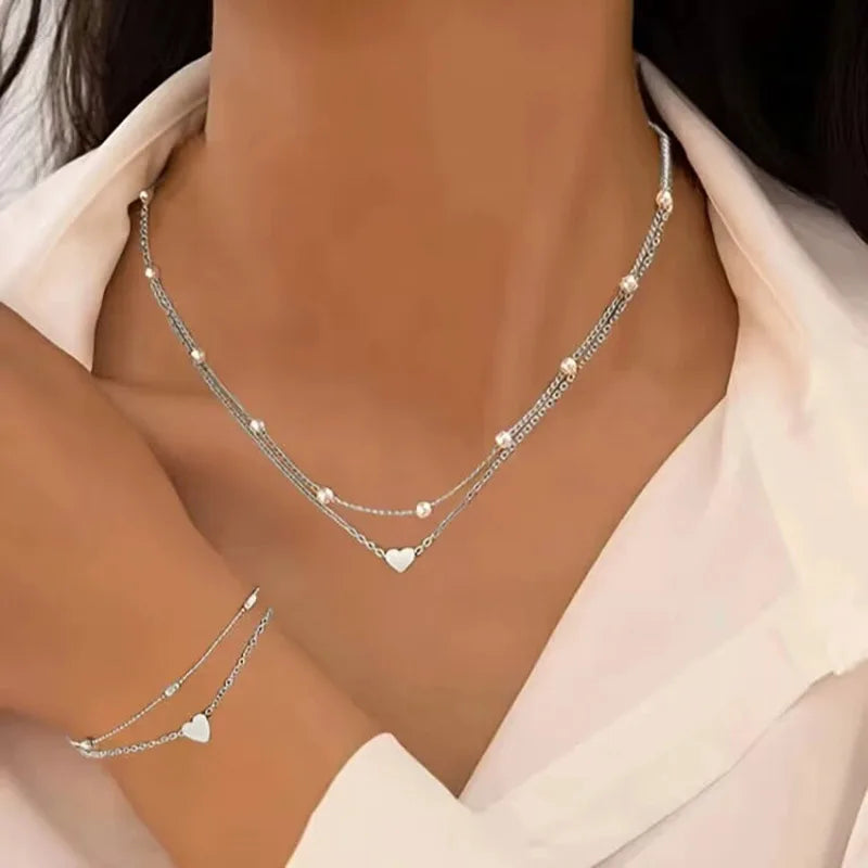 Parure Élégance Royale – Collier & Bracelet Cœur Perlé