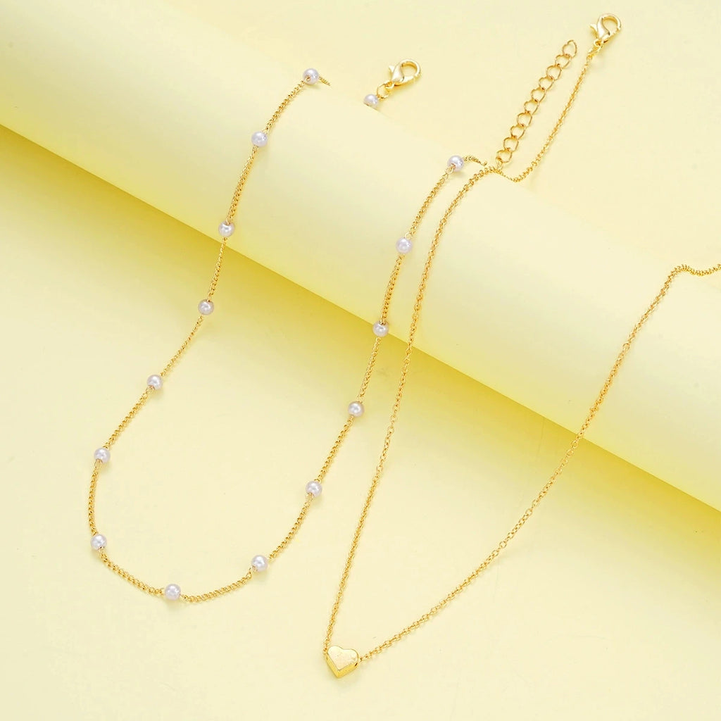 Parure Élégance Royale – Collier & Bracelet Cœur Perlé