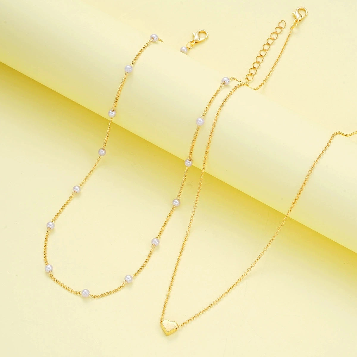 Parure Élégance Royale – Collier & Bracelet Cœur Perlé