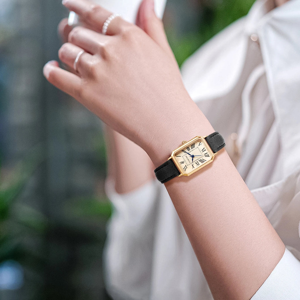 Montre Femme Élégance Absolue – Cadran Doré & Bracelet Cuir Noir