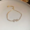 Bracelet Signature Ondulé en Cristal