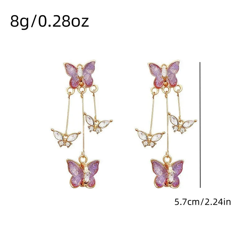 Boucles d’Oreilles Papillon Cristal Violet – Élégance Délicate
